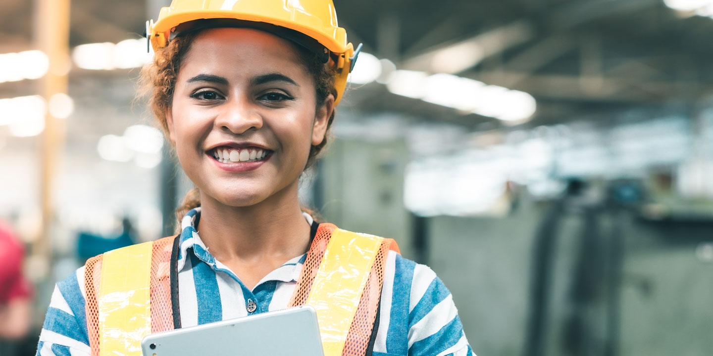 Woman Engineer working and smiling
